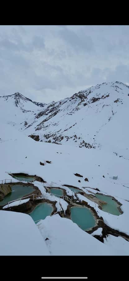 Full-Day Embalse del Yeso & Hot Springs Tour from Santiago - Getting out of Santiago: pickup and the Cajón del Maipo drive