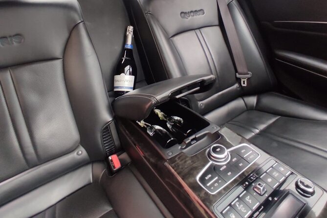 Luxury Airport Private Transfer SCL - The Name-Sign Pickup System (And Why It Matters)