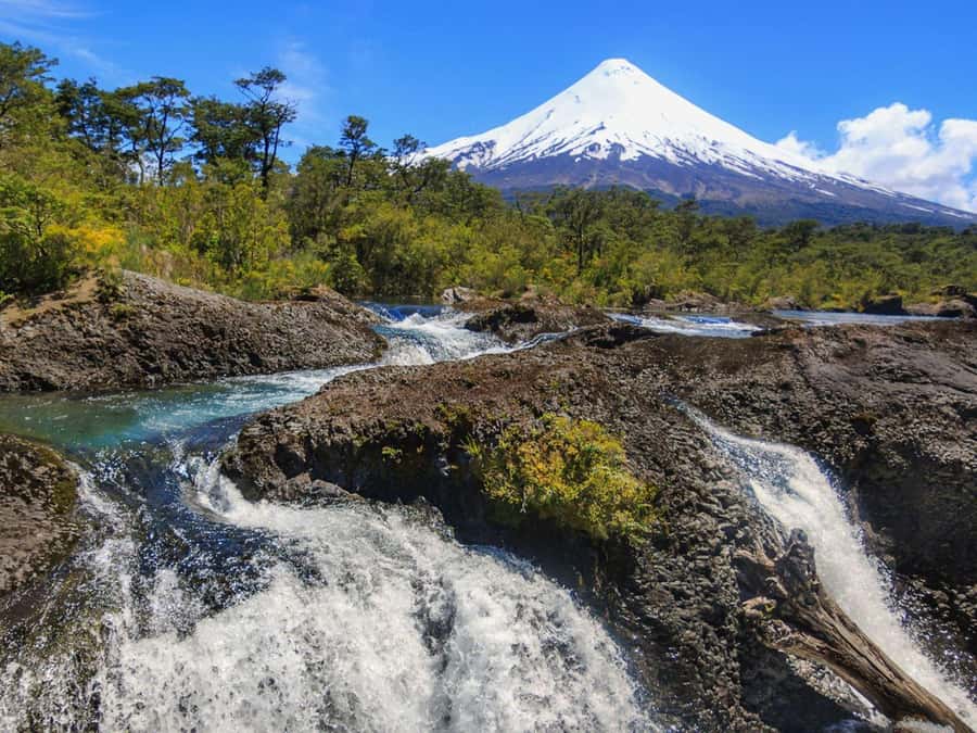 Puerto Varas: Osorno Volcano Day Trip by Air-conditioned Van - The Osorno Base at 1,240 Meters: Ski and Mountain Center First Stop