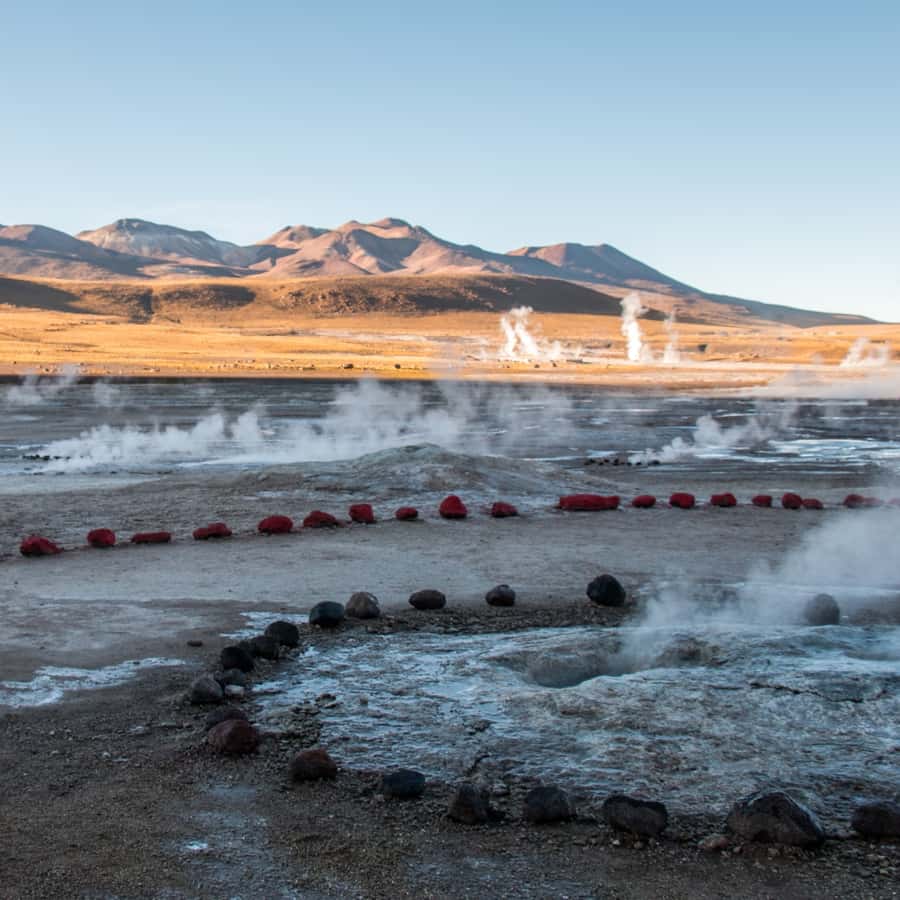San Pedro de Atacama: Geysers del Tatio - Outdoor Breakfast on the Altiplano, Then Walking Among Steam