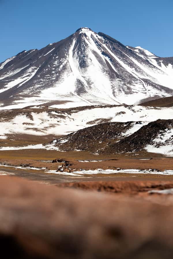 San Pedro de Atacama: Red Rocks & Altiplano Lagoons Day Trip - Piedras Rojas and Salar de Aguas Calientes: the red-rock walk that makes the day feel real