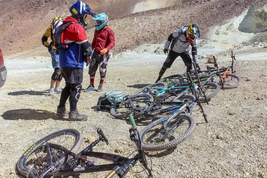 San Pedro de Atacama: Volcano Downhill Bike Tour - Cerro Toco summit prep at about 17,000 feet