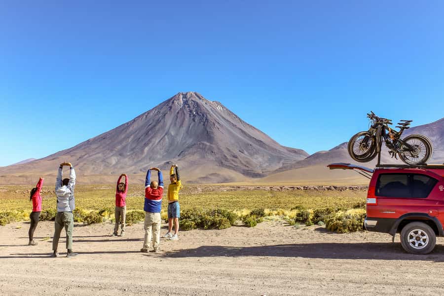San Pedro de Atacama: Volcano Downhill Bike Tour - Morning logistics that start at Casa Quitor and depend on wind