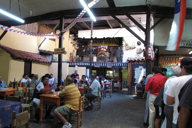 Santiago city experience: Walking tour, Market visit, Lunch & Coffee included - Old Santiago core: La Moneda, Plaza de Armas, and the Cathedral
