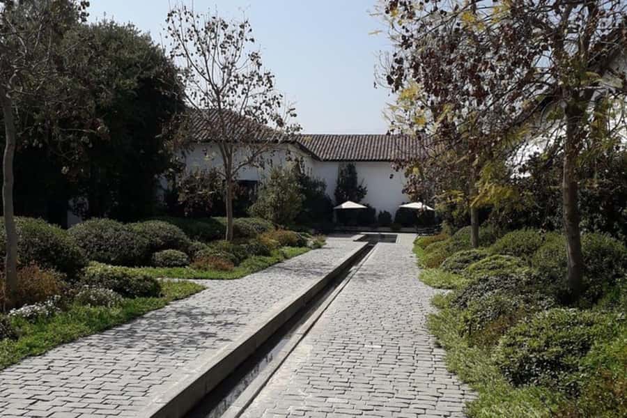 Santiago de Chile: Half-Day City Tour with Local Cuisine - Bellavista for local food energy, plus Bicentennial Park and sculptures