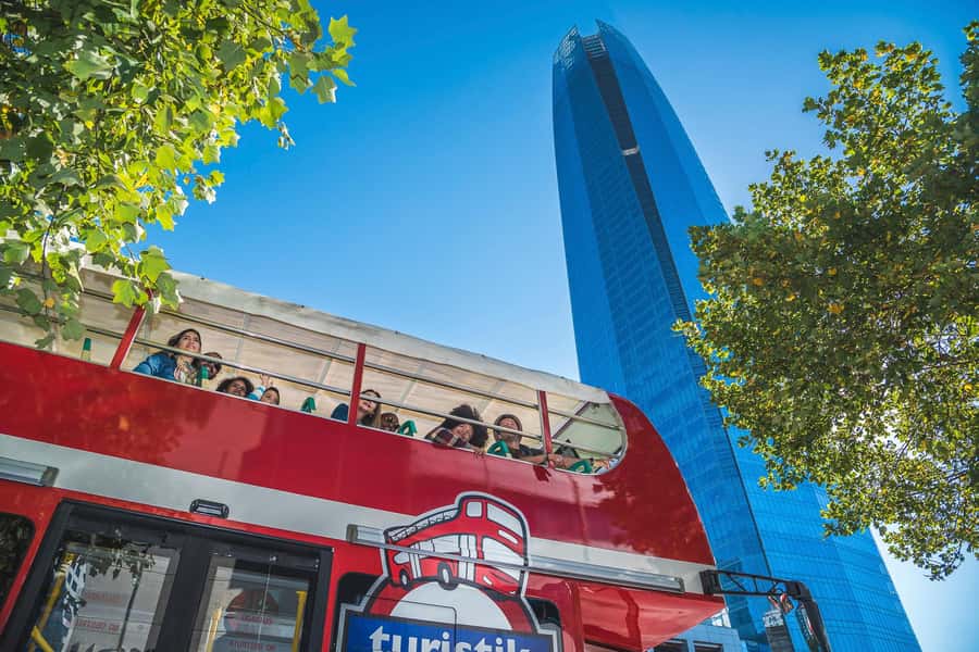 Santiago: Hop-on Hop-off Bus Day Ticket with Audio Guide - Plaza de la Aviación and El Golf: riverside calm by the Mapocho
