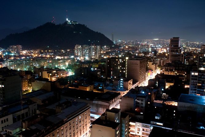 Small-Group Tour: Night City Tour with Santa Lucia Hill and Dinner Show - Downtown Santiago by night: Plaza de Armas and the cathedral glow