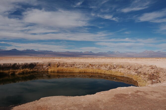 Tour to Laguna Cejar, Ojos del Salar and Laguna Tebinquiche - Stop 2: Ojos del Salar, Two Circular Lagoons in the Salt Flat